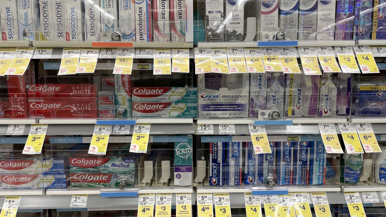 220728161024-04-us-drugstores-locked-up-products.jpg
