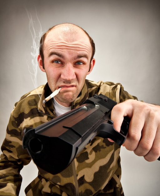 impudent-bandit-with-gun_266732-12400.jpg